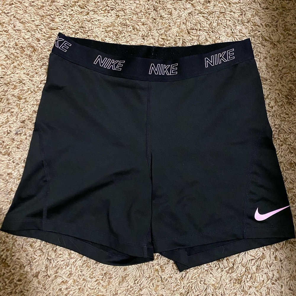 XL baby pink Nike pros